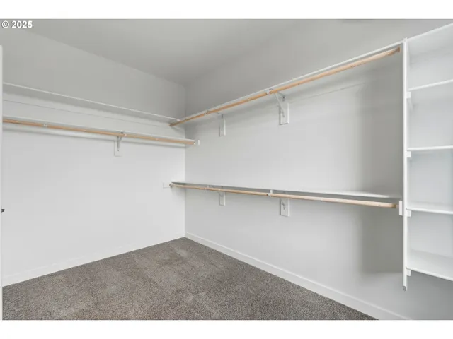 a bathroom with a sink shower and a toilet