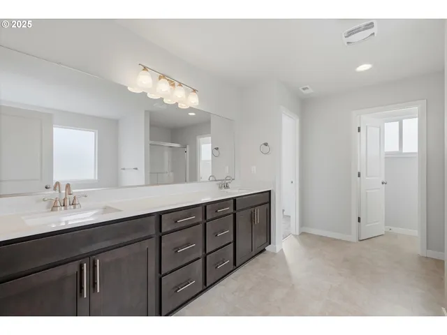 a white bath tub sitting in a bathroom
