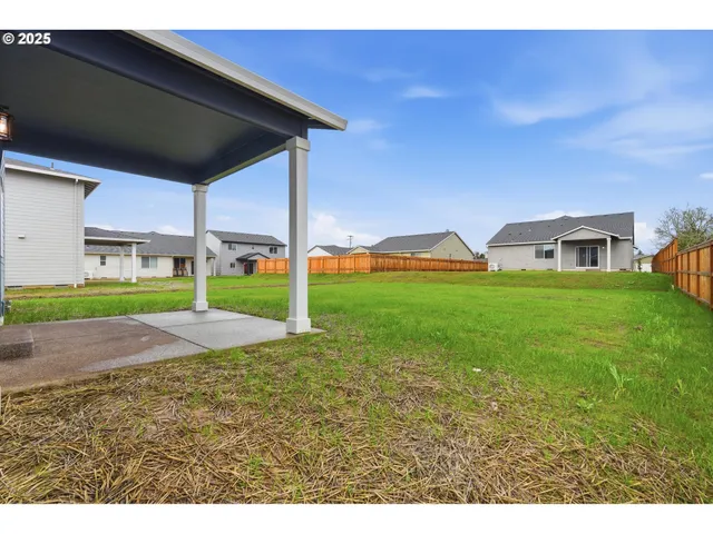 a view of a house with a big yard