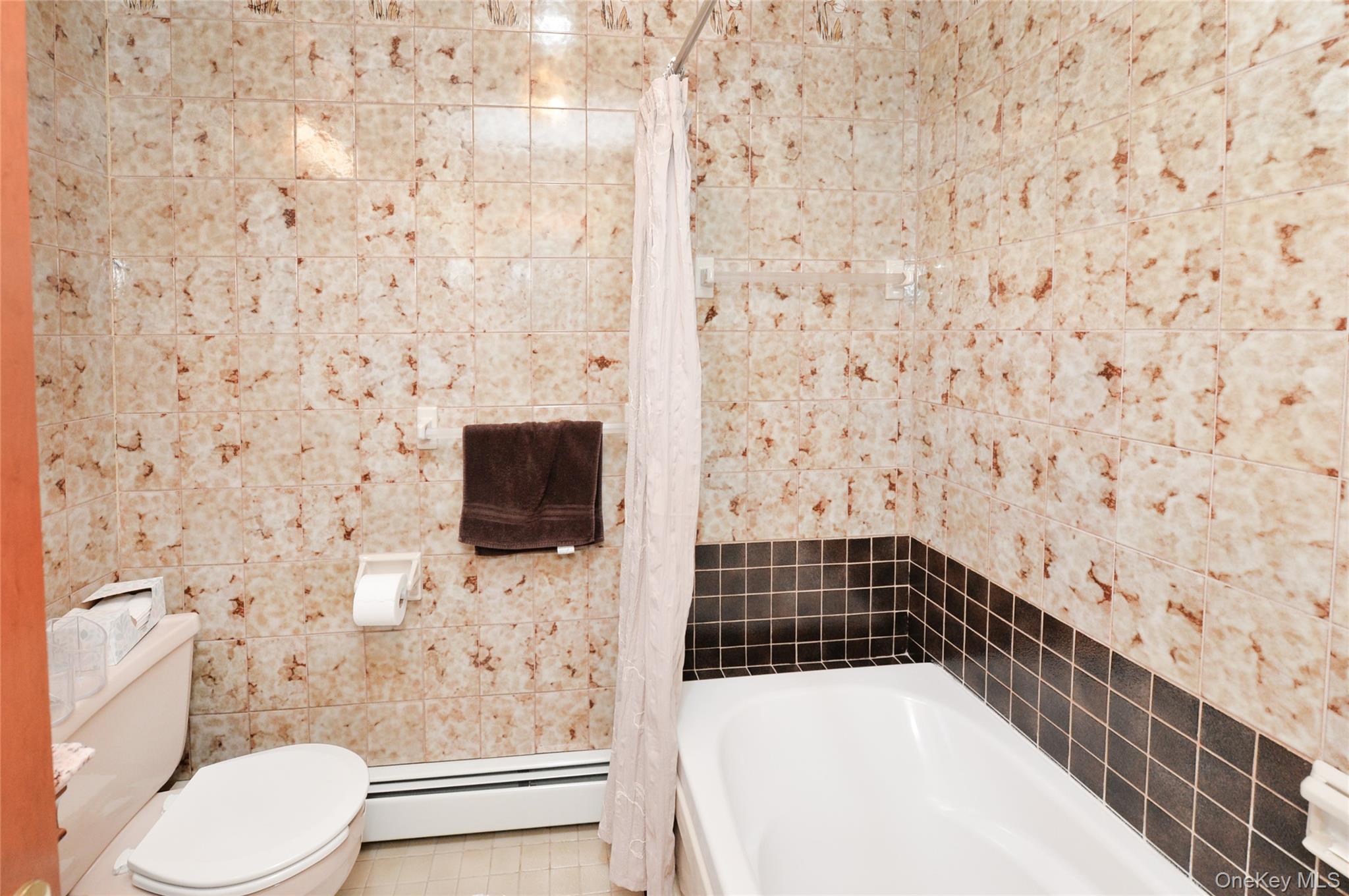 24 Highview Road Monsey, NY 10952 - Photo 28 of 44 a bathroom with a shower and toilet