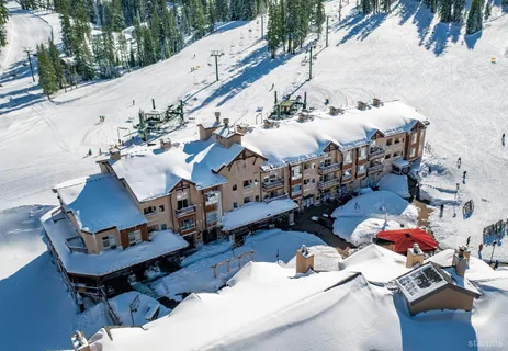 a view of a terrace with furniture and garden