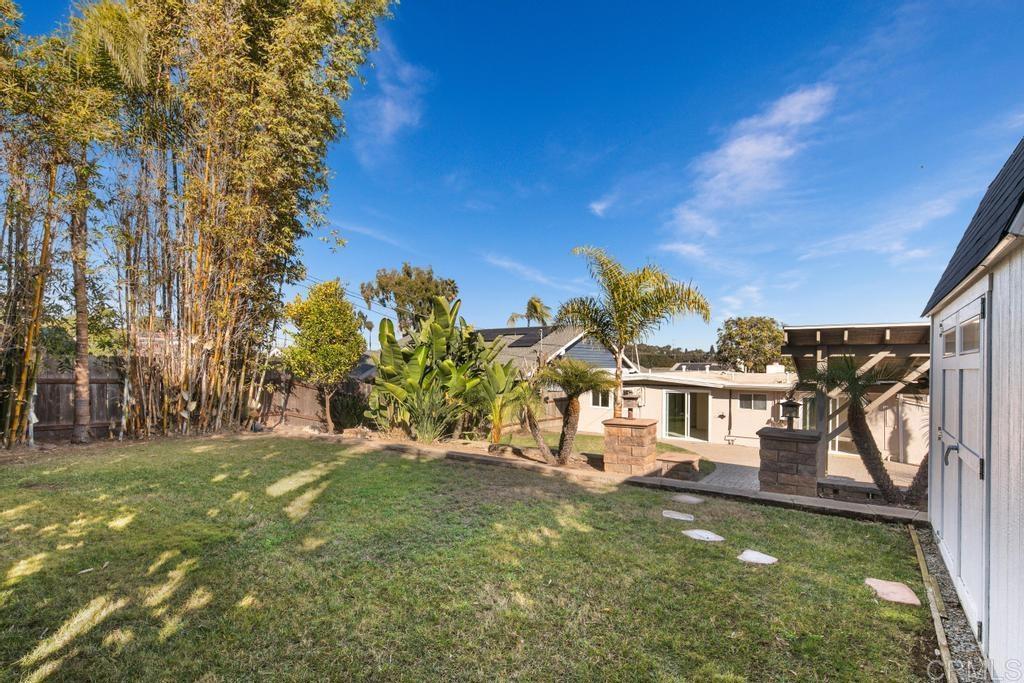 5199 El Arbol Drive Carlsbad, CA 92008 - Photo 16 of 57 View of 3rd flat grassy lawn area. What would you put here? Pool? Play area?