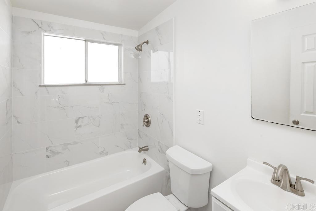 5199 El Arbol Drive Carlsbad, CA 92008 - Photo 8 of 57 Updated bath with new tub, tile and fixture.