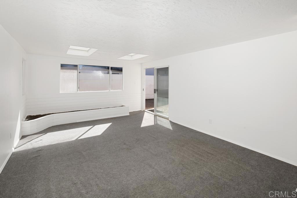 5199 El Arbol Drive Carlsbad, CA 92008 - Photo 9 of 57 Tons of options for this bonus room.