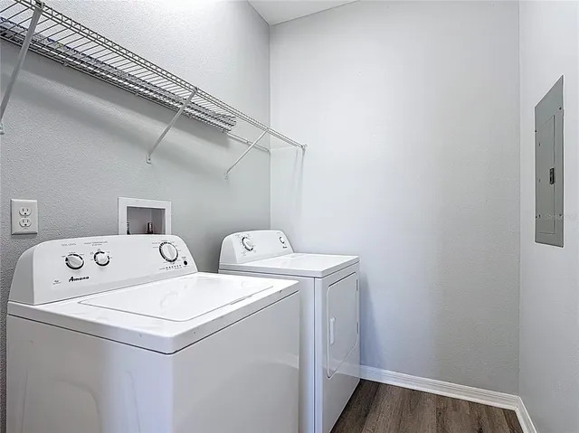 a utility room with dryer and washer