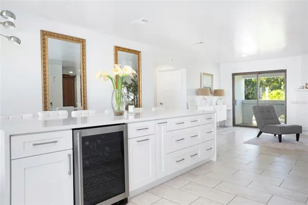 a kitchen with cabinets and stainless steel appliances