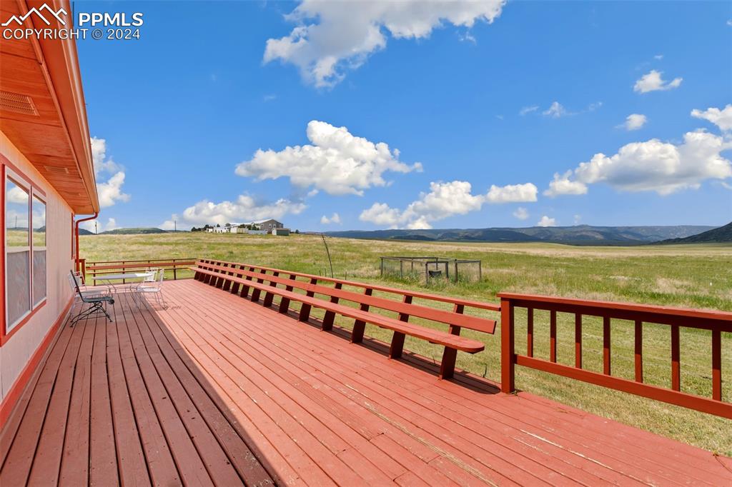 12155 South Mesa View Road Larkspur, CO 80118 - Photo 14 of 16 a view of an ocean from a balcony