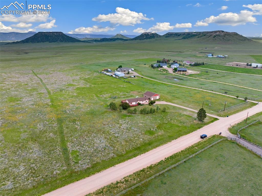 12155 South Mesa View Road Larkspur, CO 80118 - Photo 6 of 16 a view of a golf course with a garden