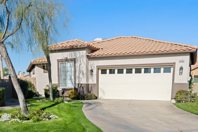 a outdoor living space with furniture and a floor to ceiling window