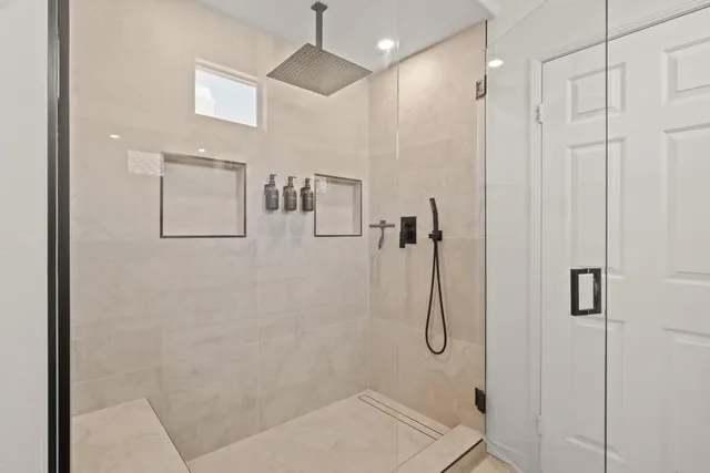 a bathroom with a toilet a sink and vanity