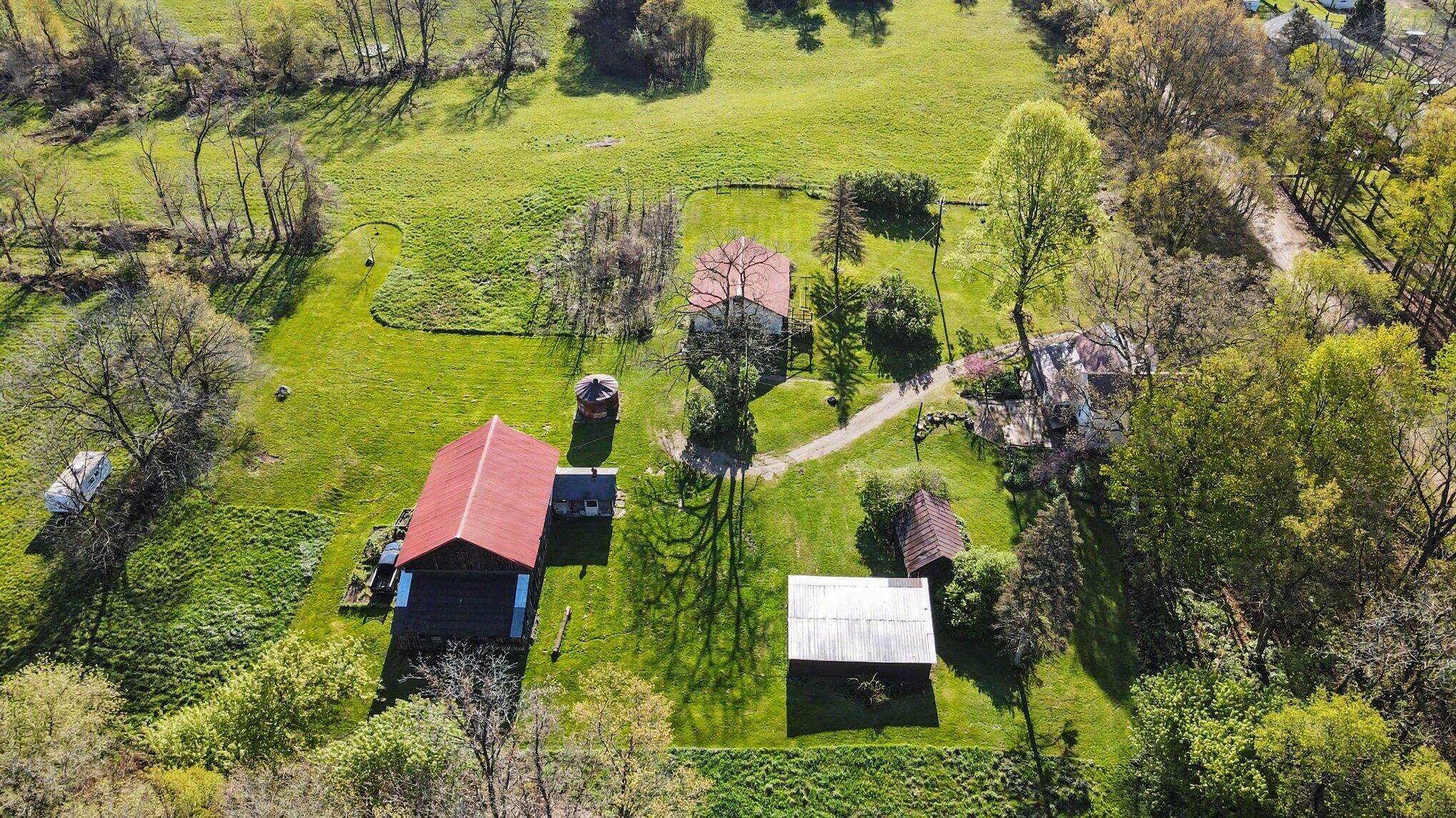 4360 Waldorf Road Delton, MI 49046 - Photo 24 of 34 Aerial View of House and Barns