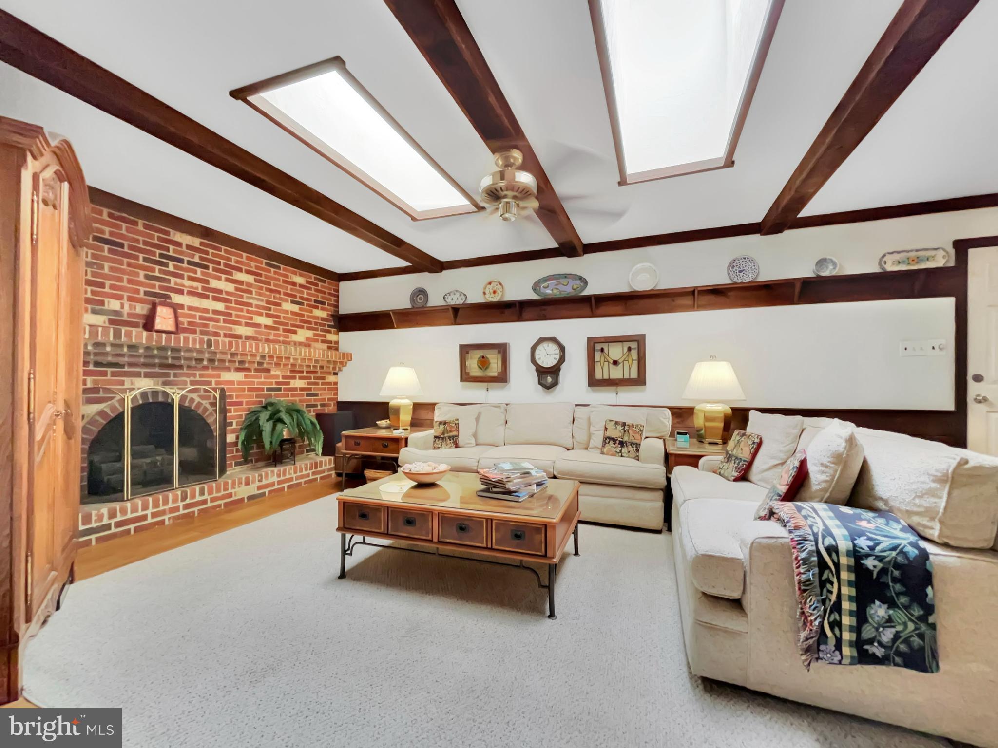 402 Norwood Road Downingtown, PA 19335 - Photo 13 of 32 a living room with furniture and a large window