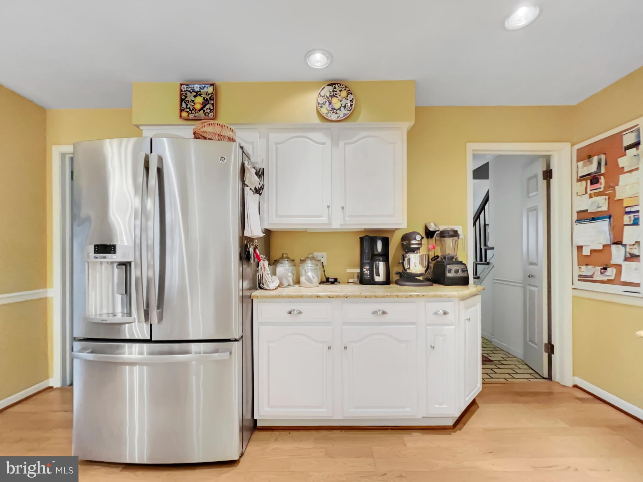 402 Norwood Road Downingtown, PA 19335 - Photo 6 of 32 a kitchen with stainless steel appliances a refrigerator a sink a stove a refrigerator and cabinets