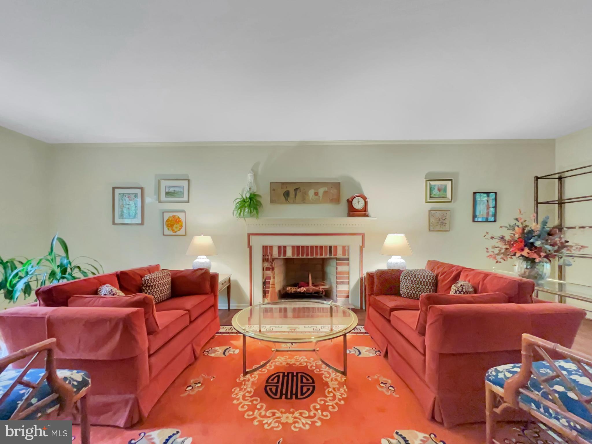 402 Norwood Road Downingtown, PA 19335 - Photo 10 of 32 a living room with furniture and a fireplace