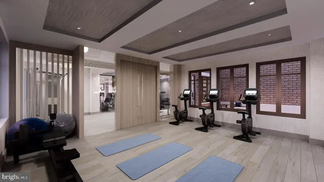 a view of balcony with furniture and potted plants