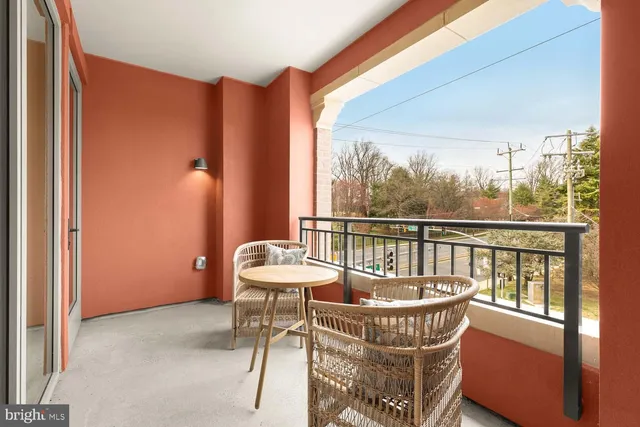 a spacious bedroom with a large bed and a window