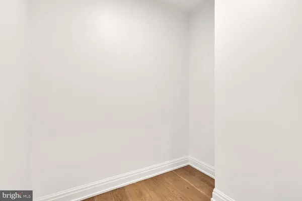 a bedroom with a bed and a bathroom