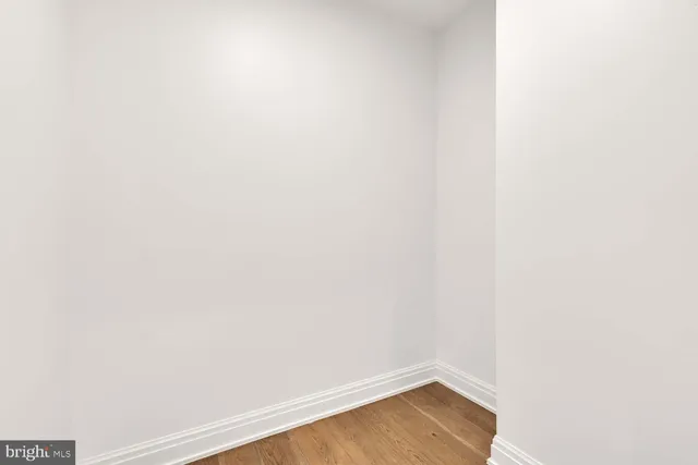 a bedroom with a bed and a bathroom