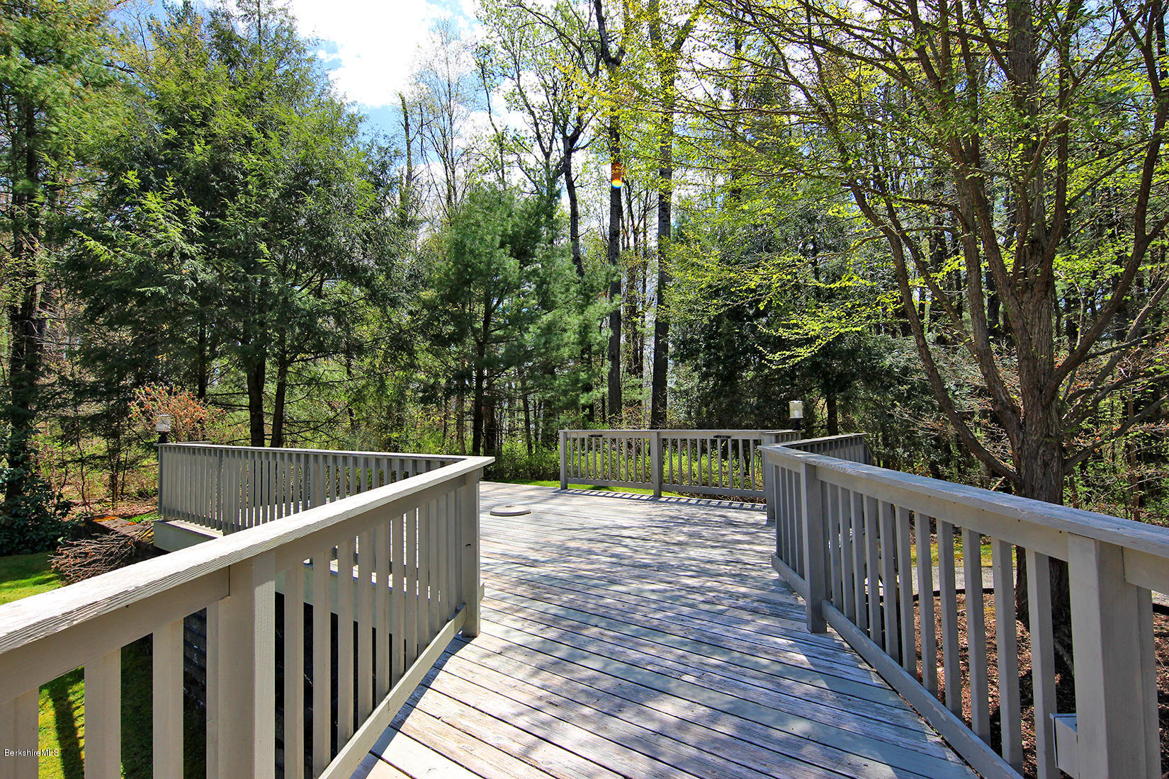 7 Rattlesnake Mountain Road Stockbridge, MA 01262 - Photo 8 of 26 a view of a balcony with wooden floor