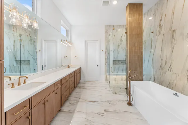 a spacious bathroom with a double vanity sink shower and a bathtub