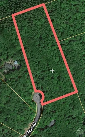 a view of a street with a sign board