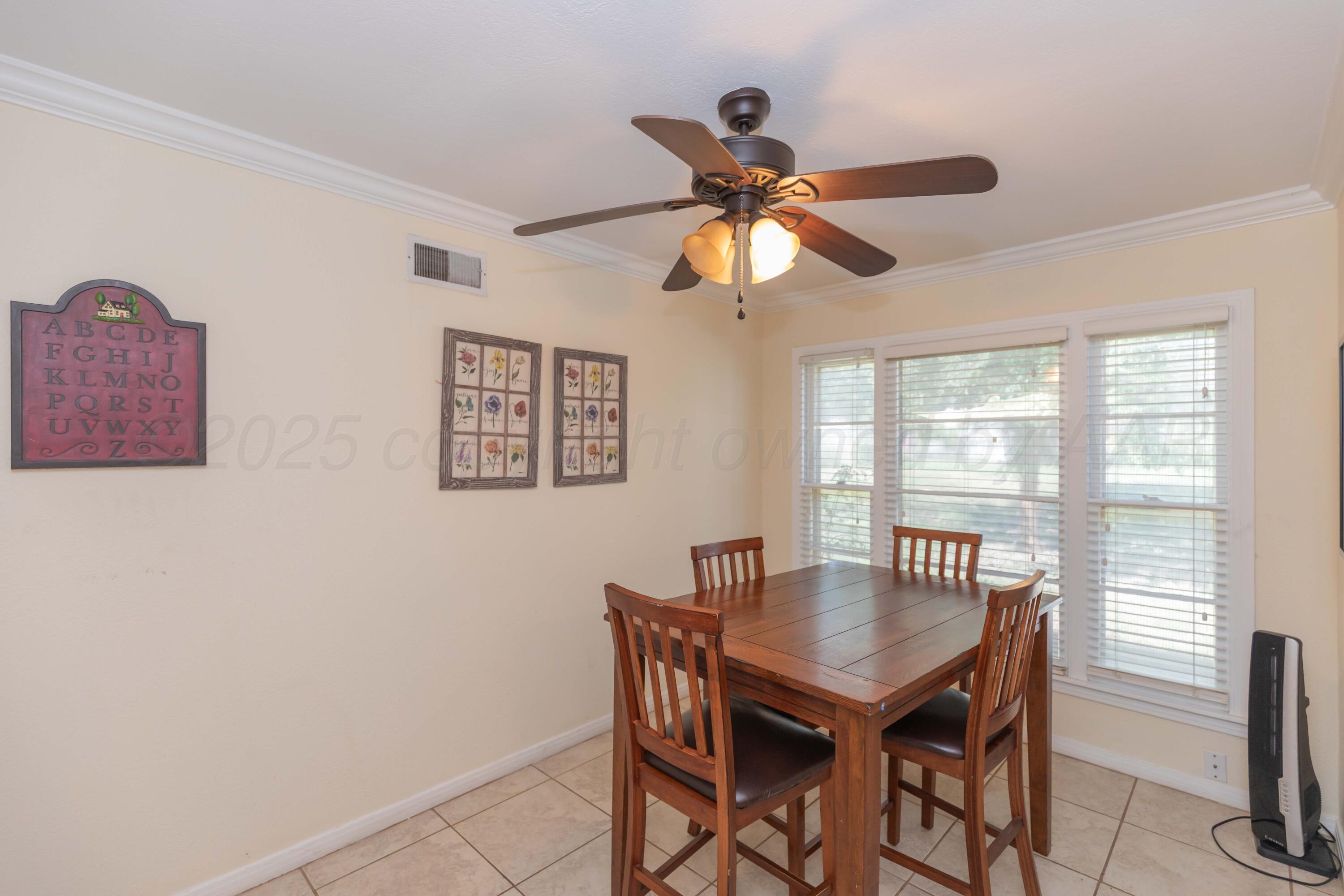 Amarillo Sunset Portfolio Amarillo, TX 79109 - Photo 225 of 279 a view of a dining room with furniture window and wooden floor