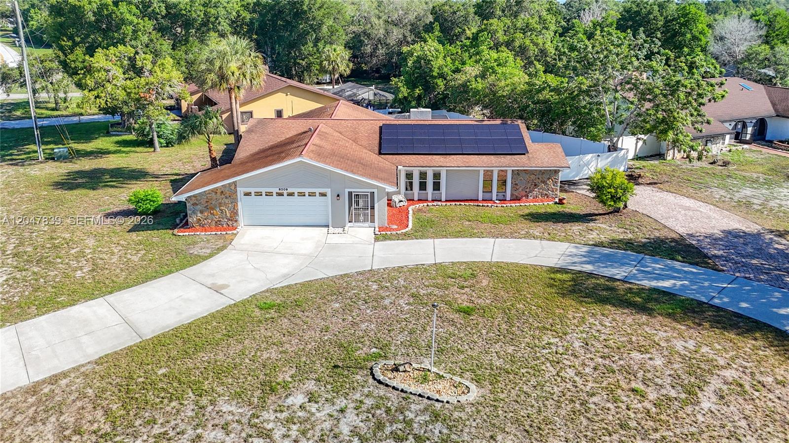 8209 Chaucer Drive Spring Hill, FL 34607 - Photo 2 of 48