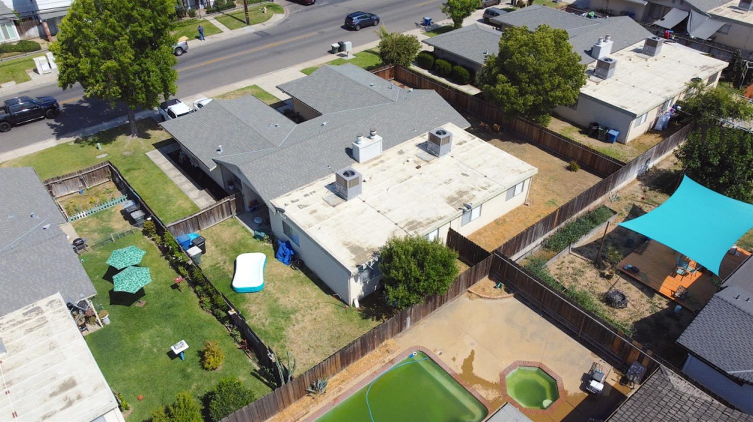 1645 Moffett Road Ceres, CA 95307 - Photo 6 of 11 an aerial view of a backyard