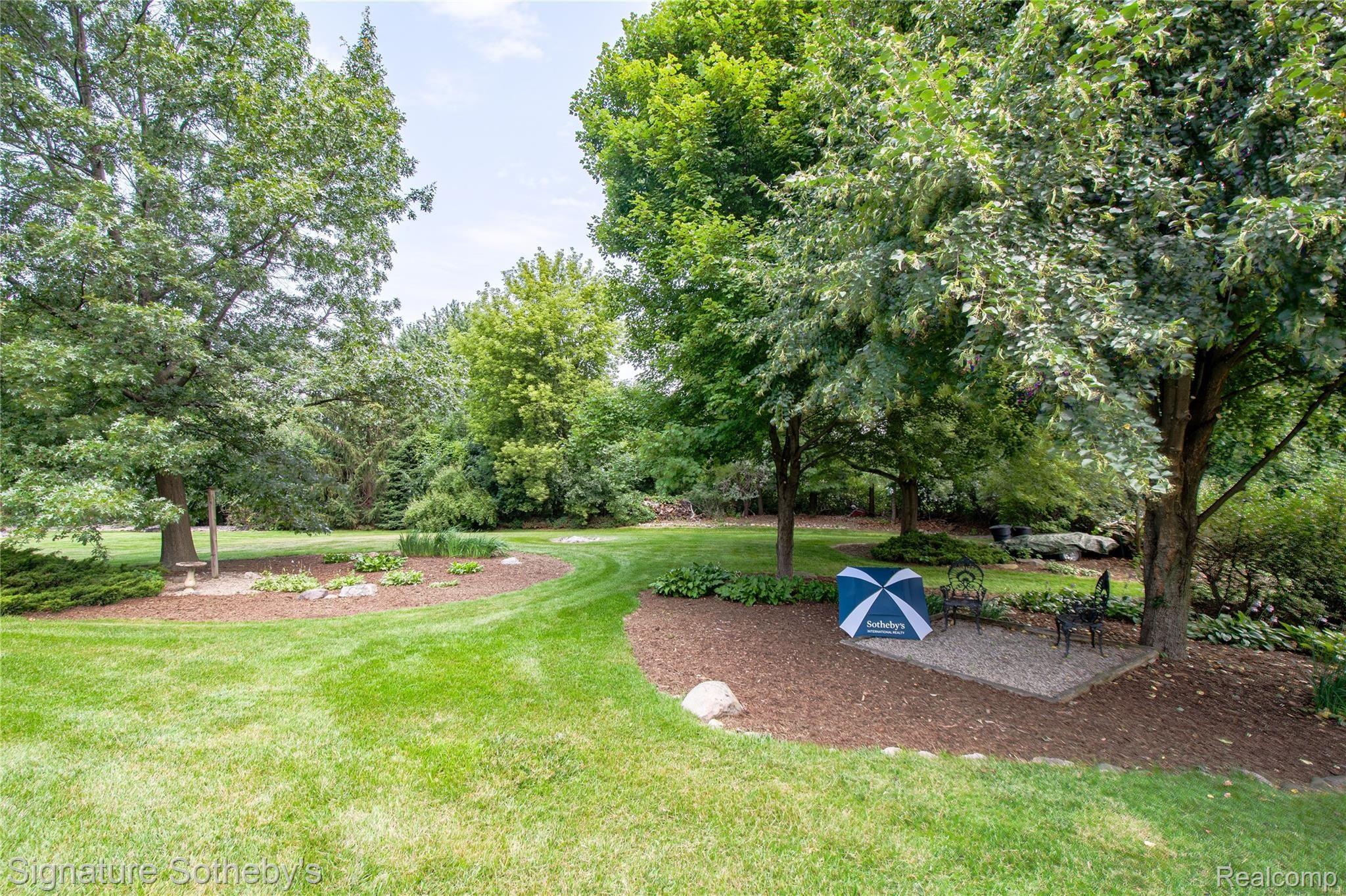 745 West Ridge Court Lake Orion, MI 48359 - Photo 42 of 44 Mature trees offer privacy