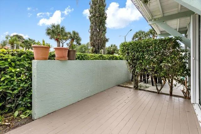 a view of outdoor space deck and tree