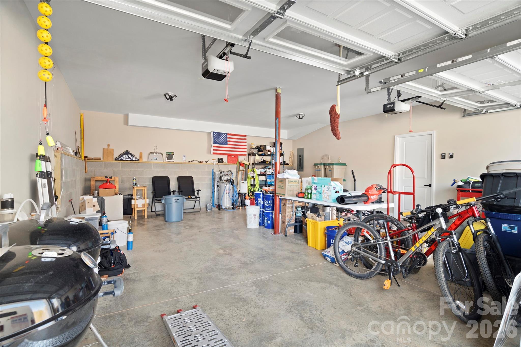 5961 Charlie Little Road Granite Falls, NC 28630 - Photo 24 of 29 a storage room with lots of white furniture
