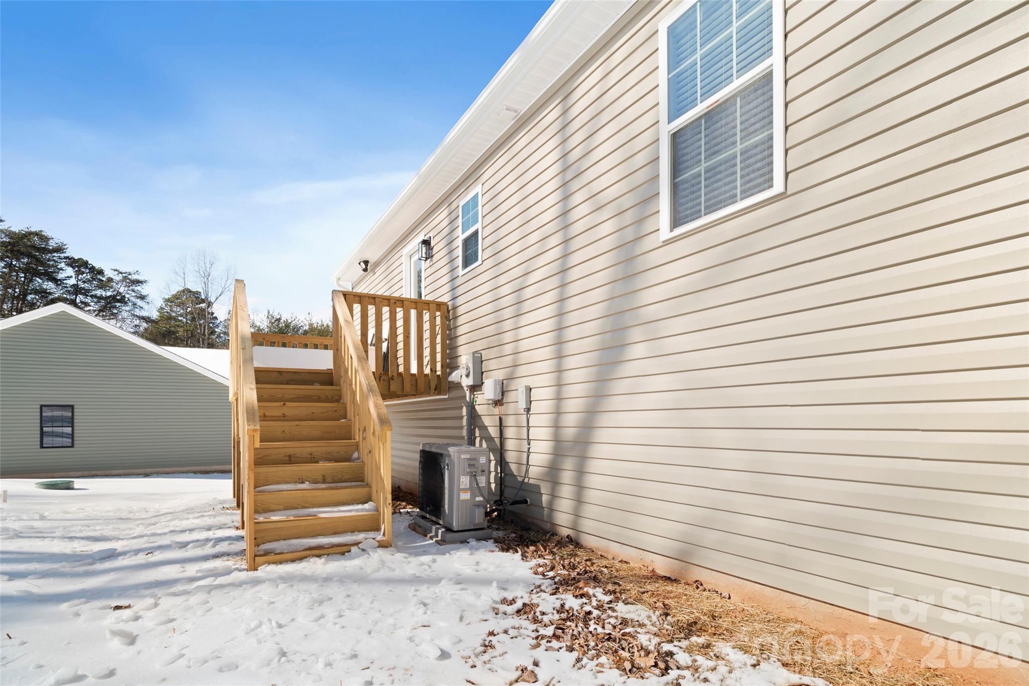 5961 Charlie Little Road Granite Falls, NC 28630 - Photo 27 of 29 a view of a house with a door