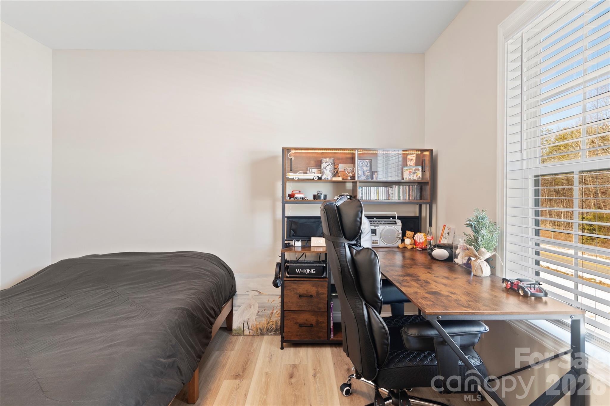 5961 Charlie Little Road Granite Falls, NC 28630 - Photo 10 of 29 a bedroom with a bed and a desk