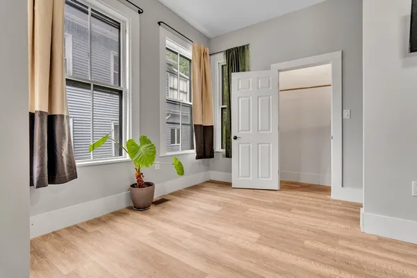 a view of livingroom with furniture and a window
