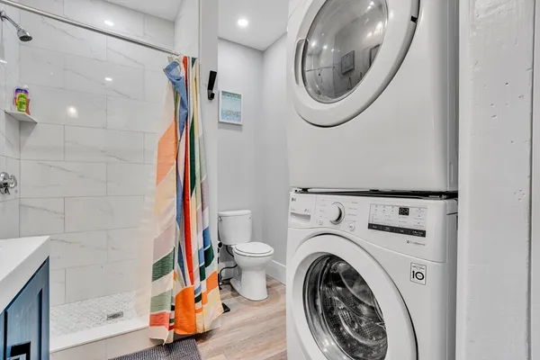a utility room with dryer and washer