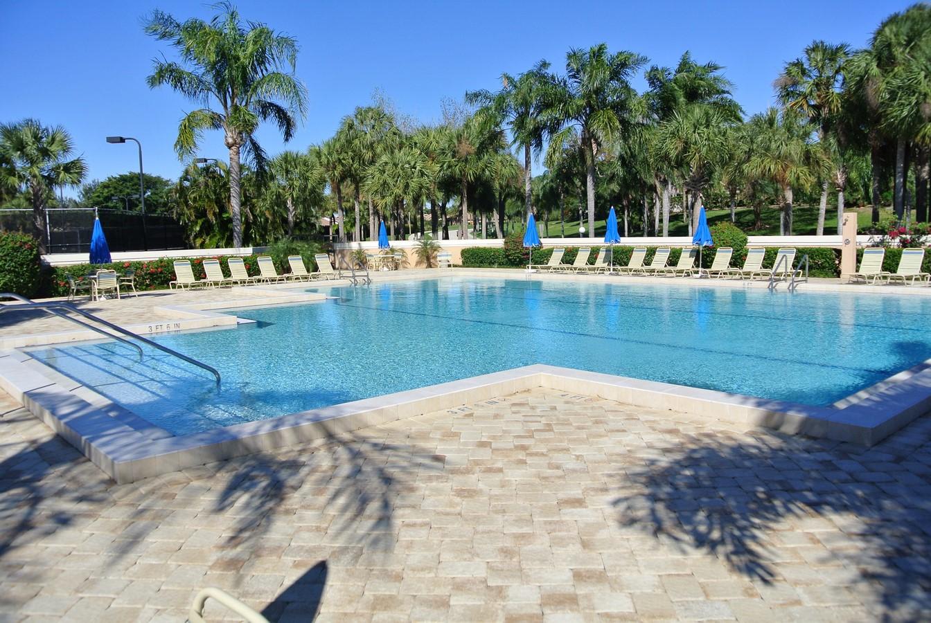 200 Ridge Road Jupiter, FL 33477 - Photo 13 of 18 a view of a swimming pool with a house
