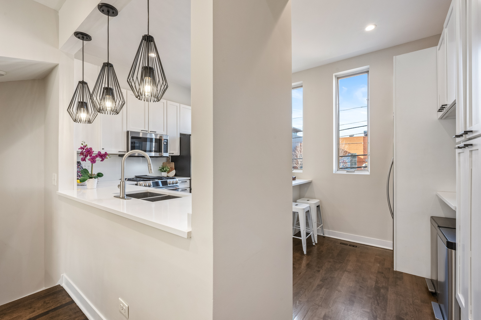 1236 West Cottage Place, Unit 1236 Chicago, IL 60607 - Photo 13 of 24 a kitchen with a sink appliances and cabinets