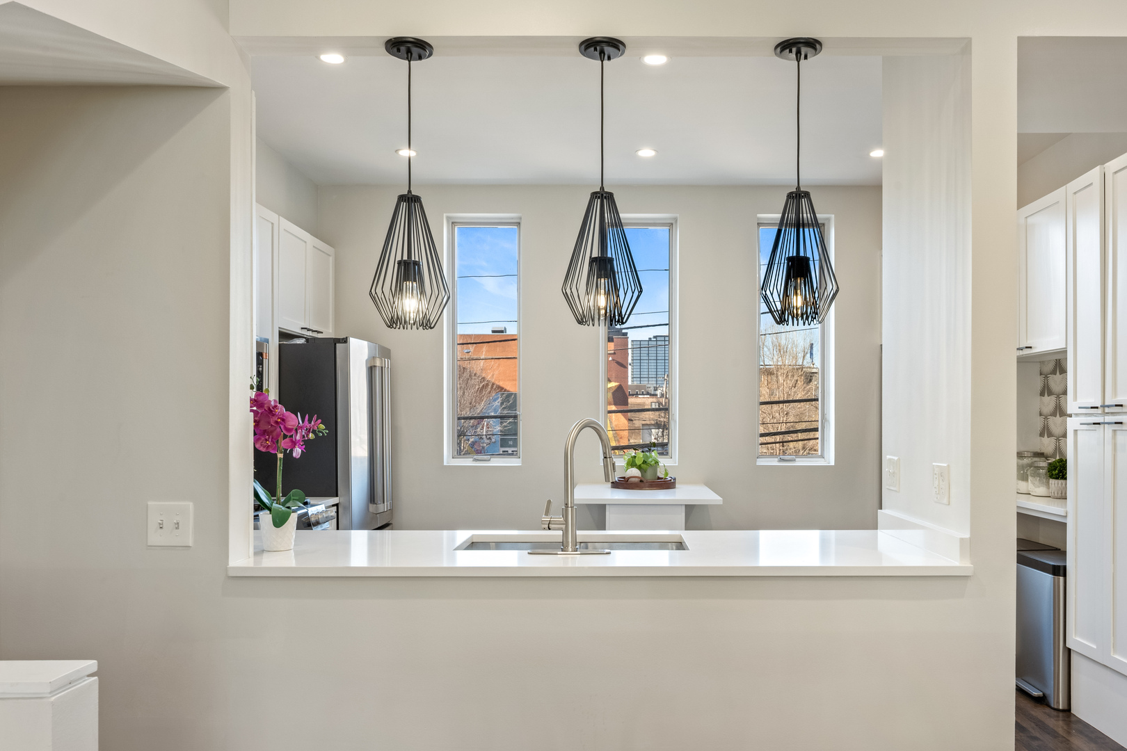1236 West Cottage Place, Unit 1236 Chicago, IL 60607 - Photo 14 of 24 a view of a living room and chandelier