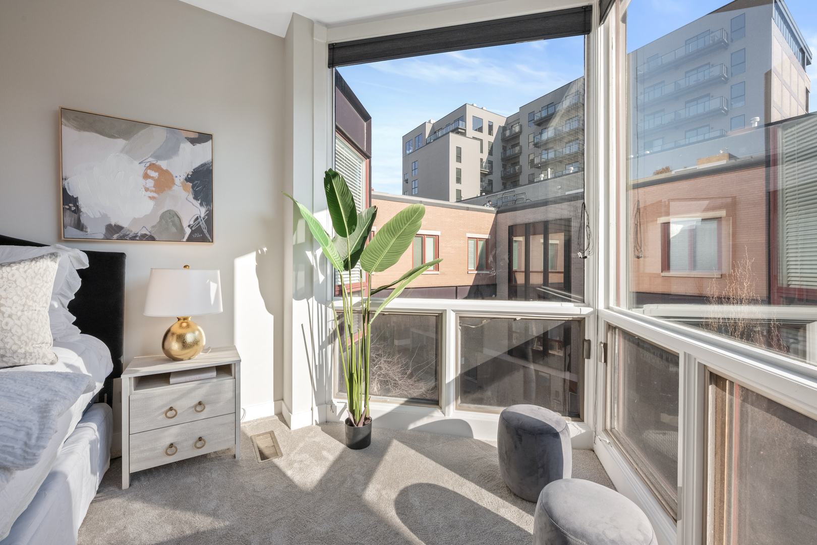 1236 West Cottage Place, Unit 1236 Chicago, IL 60607 - Photo 16 of 24 a living room with furniture and a flat screen tv