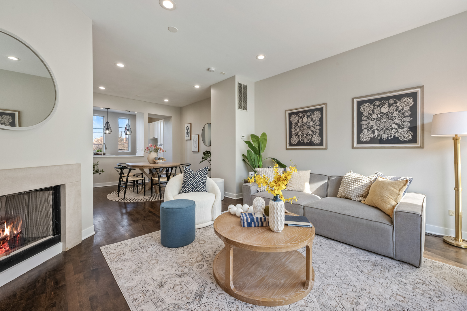 1236 West Cottage Place, Unit 1236 Chicago, IL 60607 - Photo 3 of 24 a living room with furniture and a fireplace