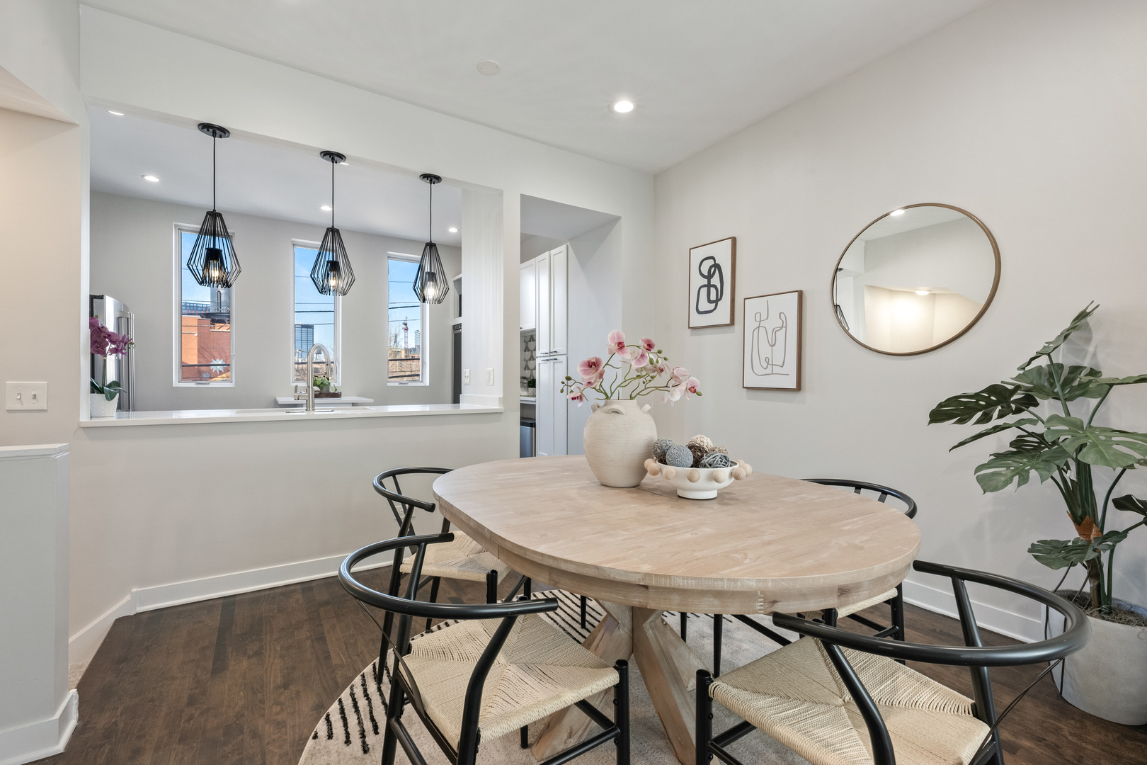 1236 West Cottage Place, Unit 1236 Chicago, IL 60607 - Photo 8 of 24 a view of a dining room with furniture and wooden floor