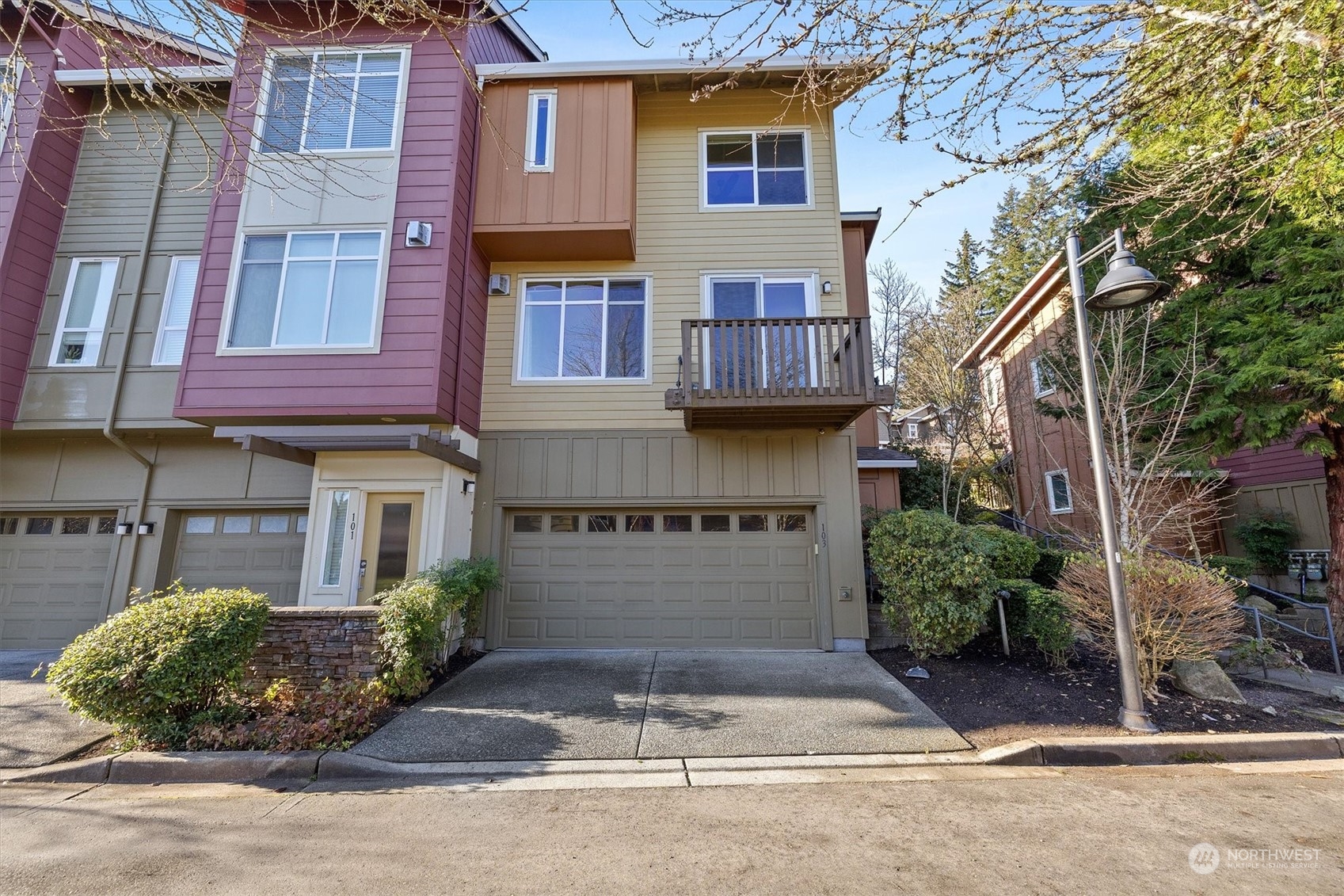 103 Sky Ridge Road Northwest Issaquah, WA 98027 - Photo 2 of 37 a front view of a house
