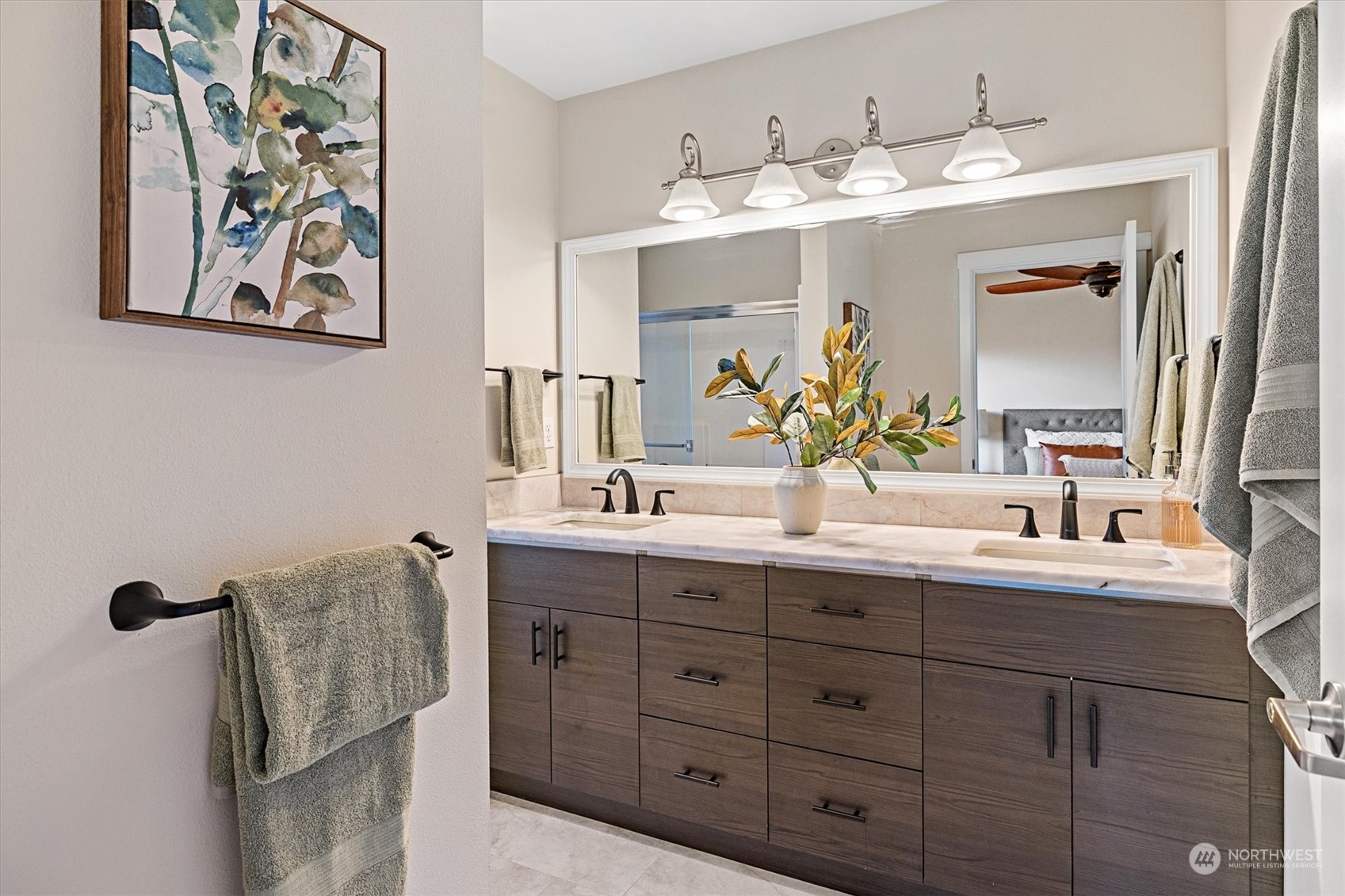 103 Sky Ridge Road Northwest Issaquah, WA 98027 - Photo 21 of 37 a bathroom with a double vanity sink and mirror