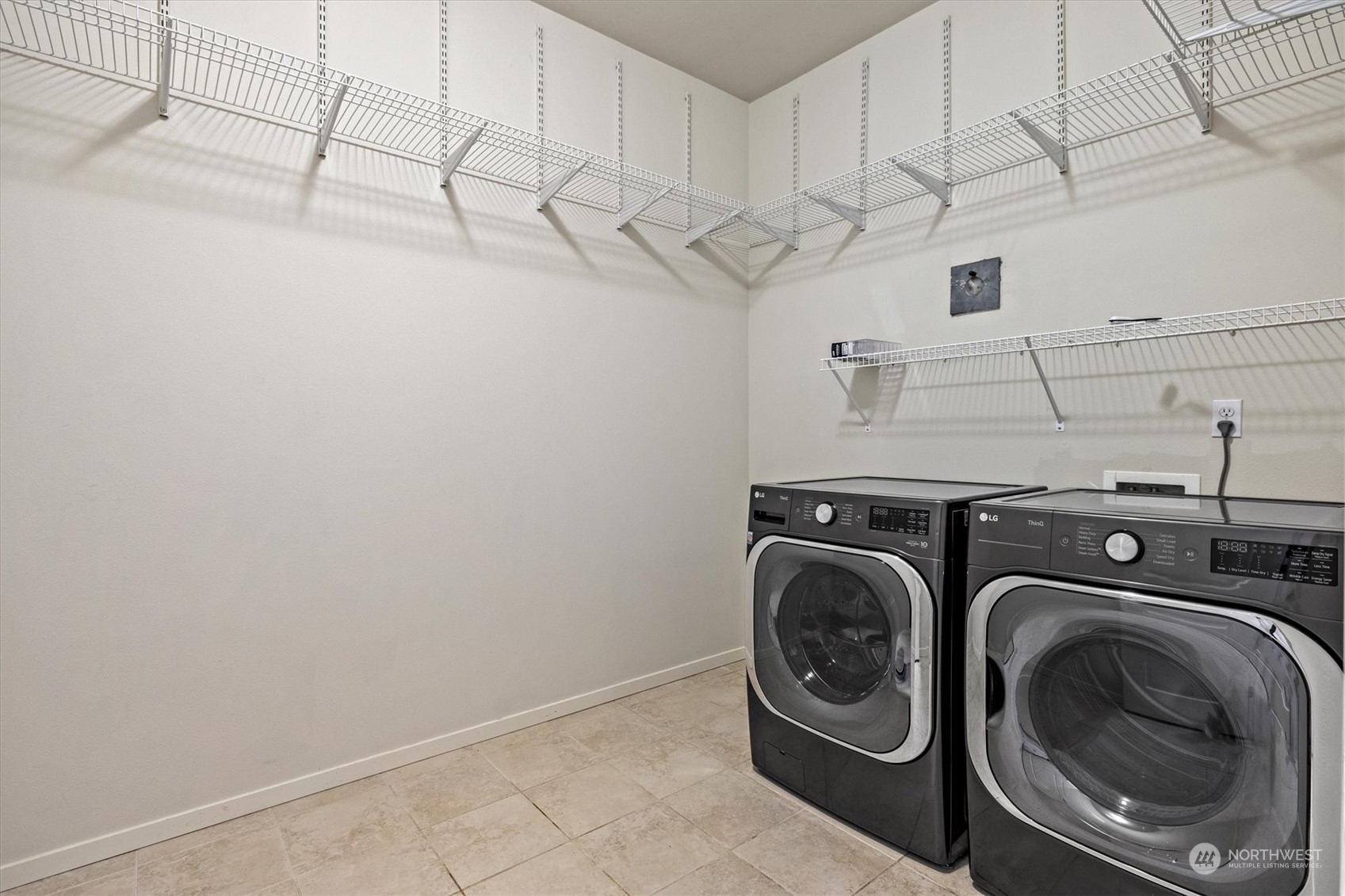 103 Sky Ridge Road Northwest Issaquah, WA 98027 - Photo 23 of 37 a utility room with dryer and washer