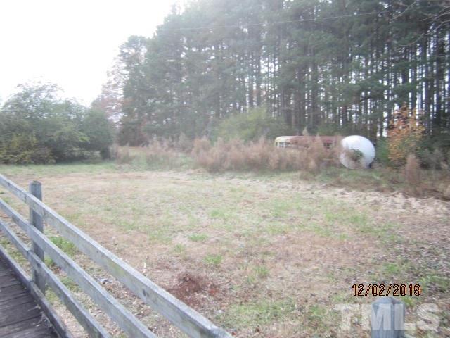 3710 Bobbitt Road Kittrell, NC 27544 - Photo 4 of 6 a view of a bench in a yard