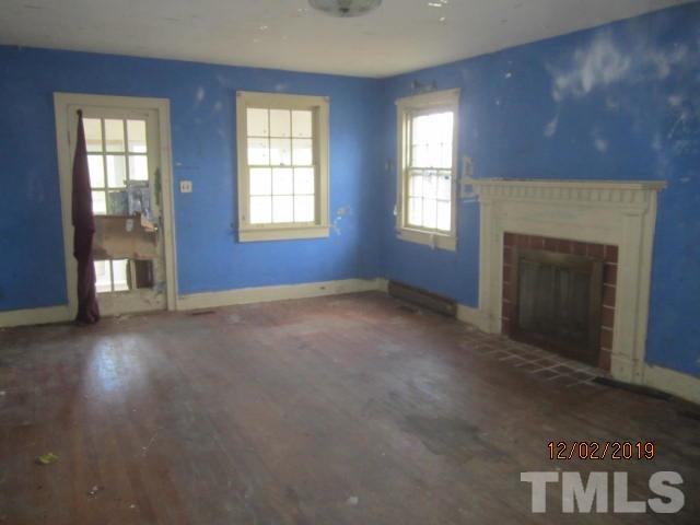 3710 Bobbitt Road Kittrell, NC 27544 - Photo 6 of 6 an empty room with windows