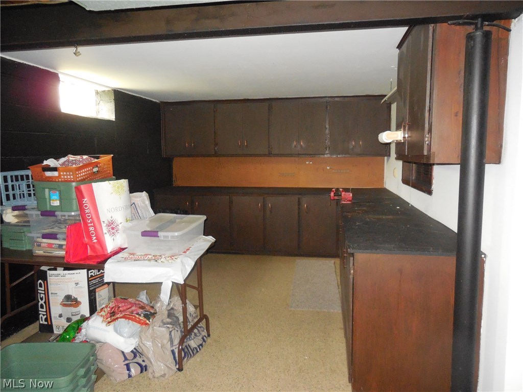 1271 Roland Road Lyndhurst, OH 44124 - Photo 25 of 27 Buffet area with pass through to rec. room featuring Nature Stone floors.