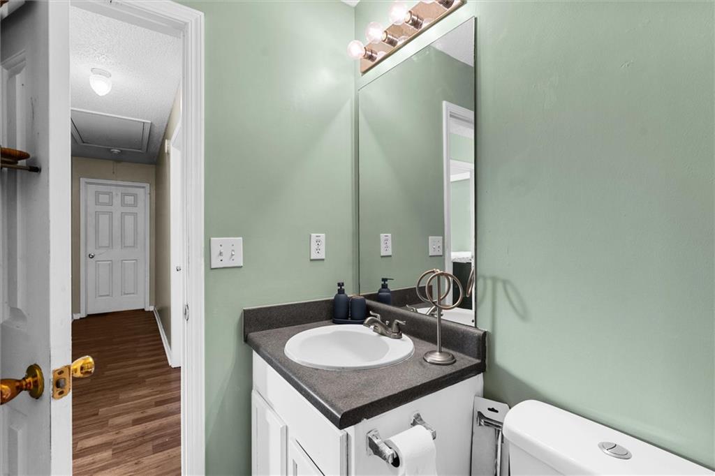 3234 Mineral Ridge Lane Stone Mountain, GA 30087 - Photo 40 of 55 a bathroom with a sink and a mirror