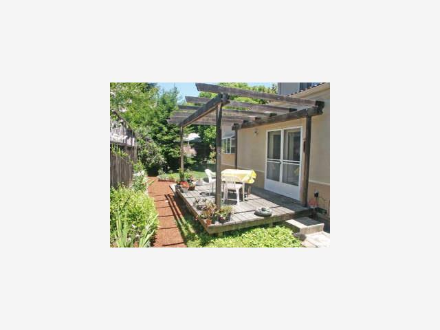 428 Bella Corte Mountain View, CA 94043 - Photo 7 of 9 a picture of a bench in a backyard