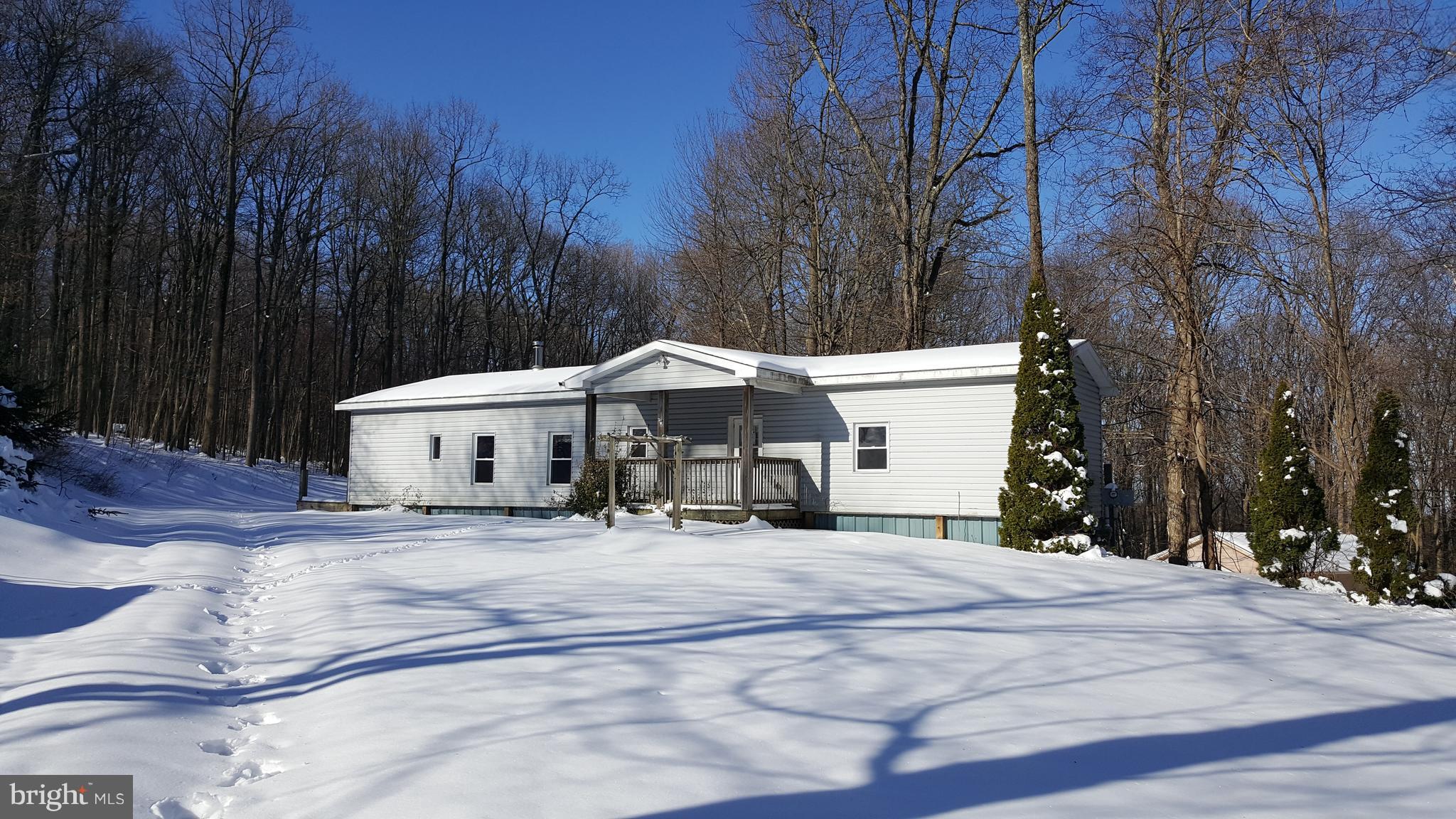 24581 Hells Delight Road Smithsburg, MD 21783 - Photo 1 of 22 a view of a white house